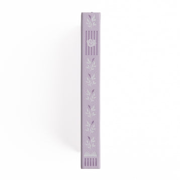 Lavender-colored decorative item with leaf patterns on a white background