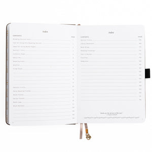 Open notebook displaying index pages on a white background