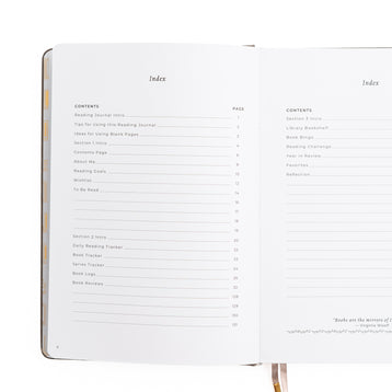 Open book showing table of contents and index on white background