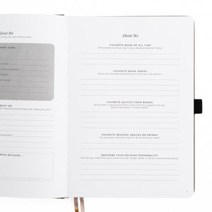 Open book with questionnaire pages on a white background